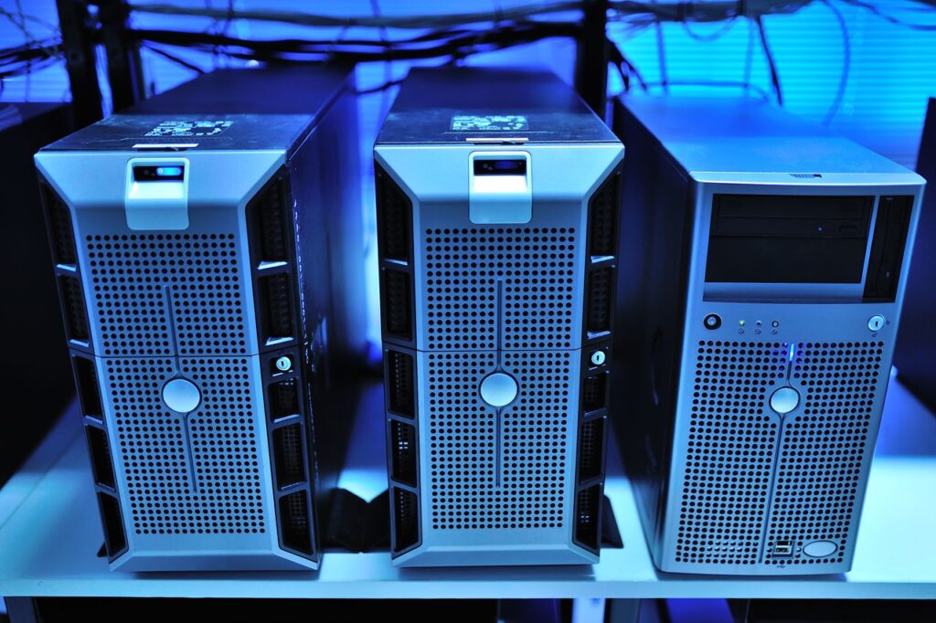 Szolgáltatások Close-up view of modern rack-mounted server units in a data center.